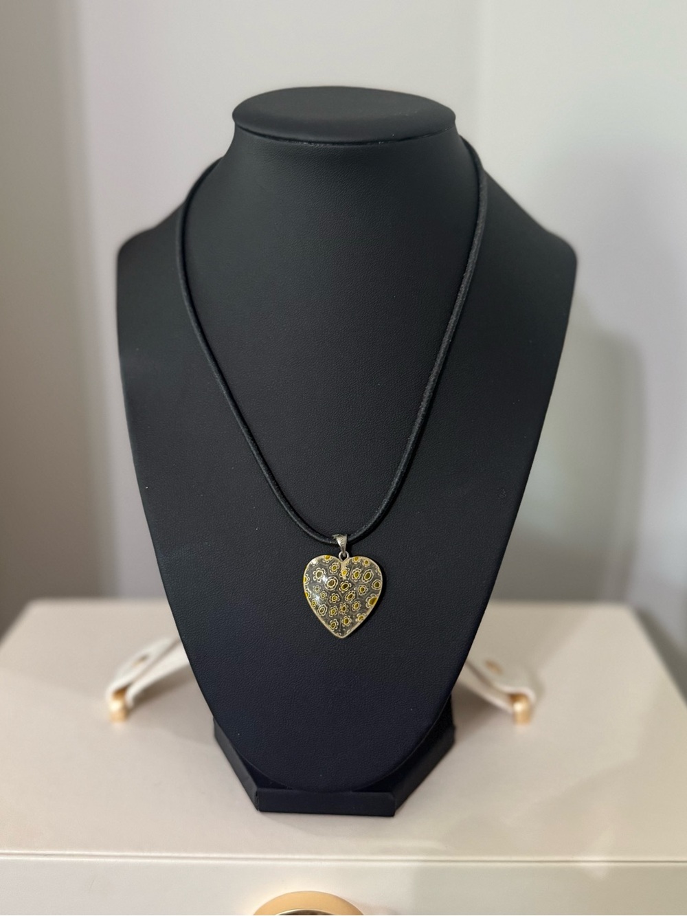 Heart Pendant Necklace with Floral Motif on black cord
